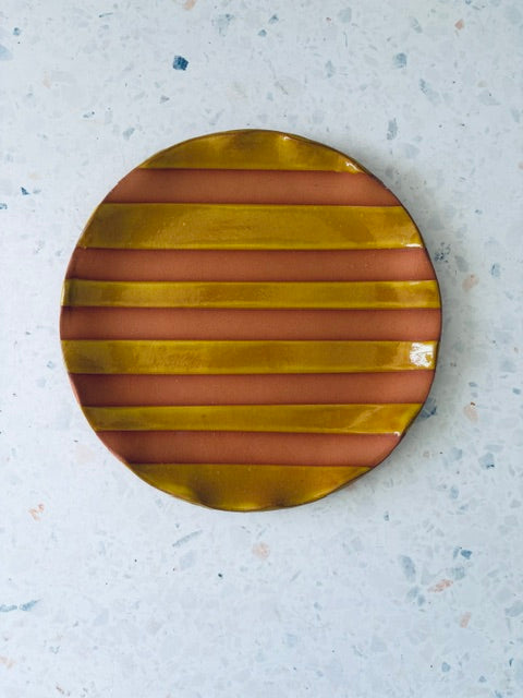 Raw terracotta and yellow side plate